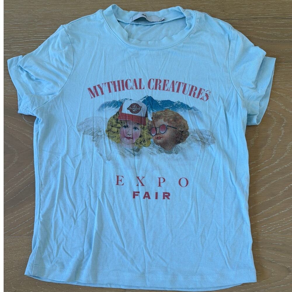Adika Mythical Creatures Expo Fair Tee Size S Baby Blue